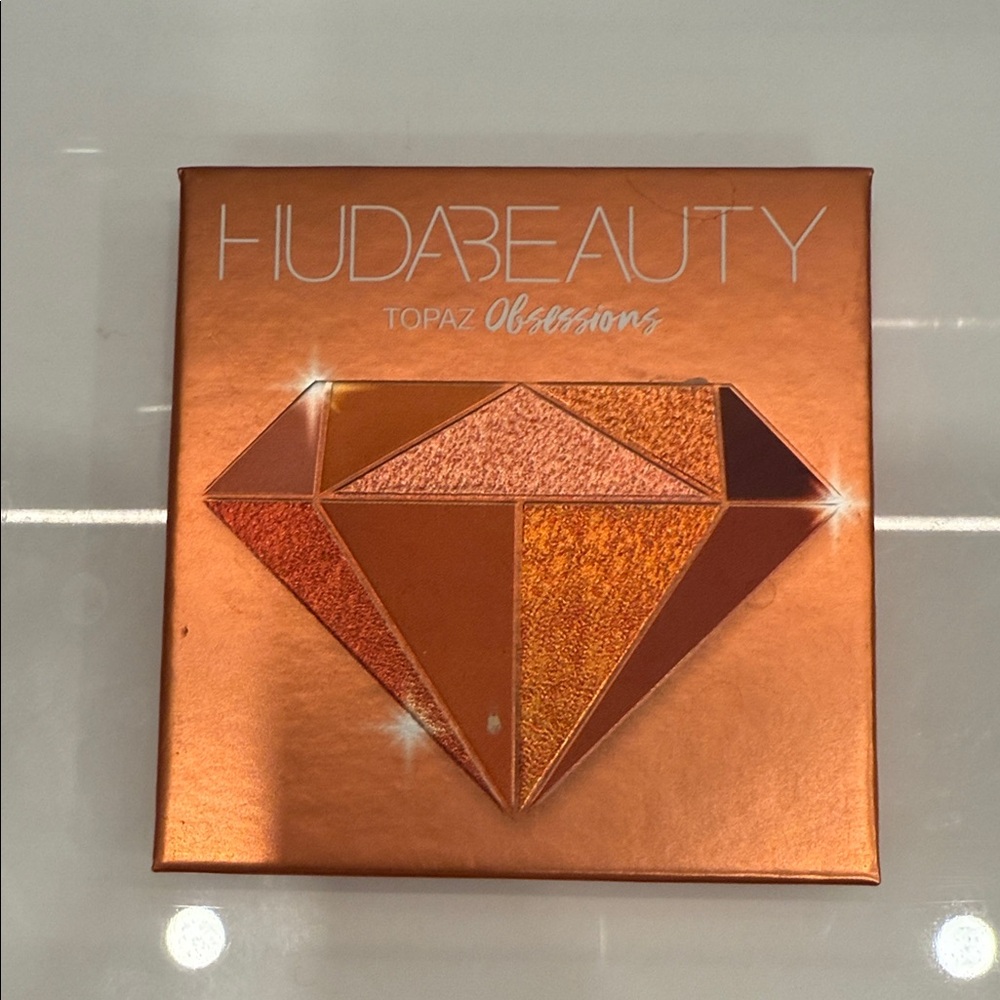 HUDA BEAUTY Topaz Obsessions Palette in Orange and Brown